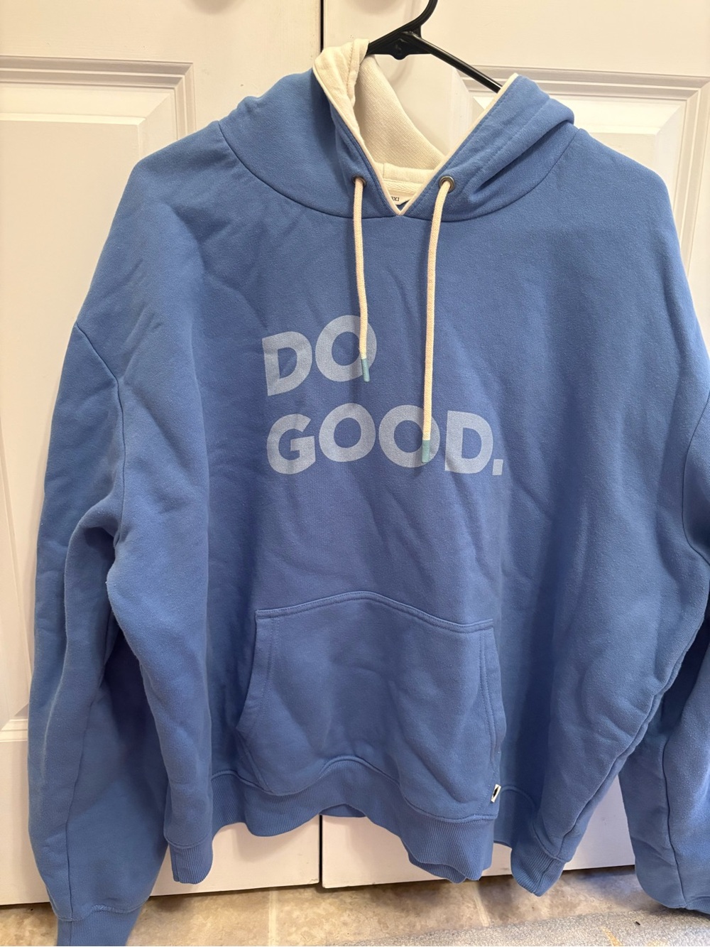 Cotopaxi Do Good Blue Hoodie with Cream Drawstrings